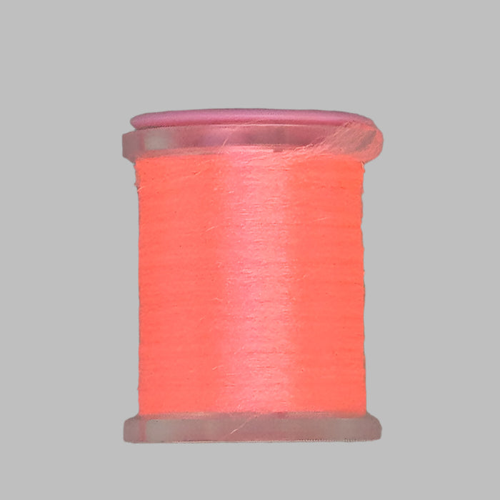 Close up fluorescent SHELL PINK Antron yarn