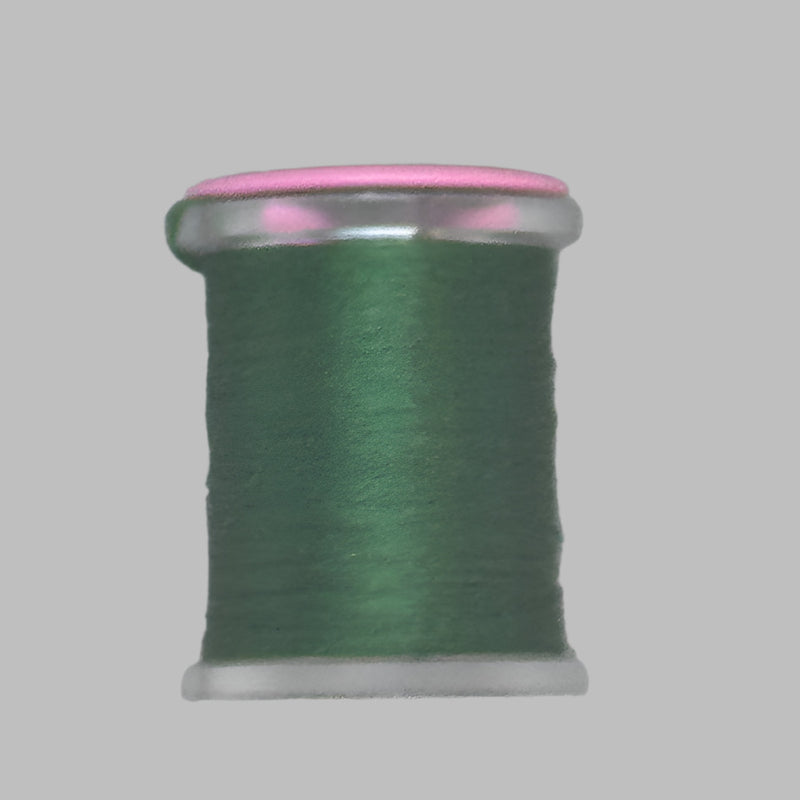 Deep green Antron yarn spool with clear plastic rim and end caps