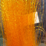 Gold yellow sparkly tinsel fibers with bright glitter