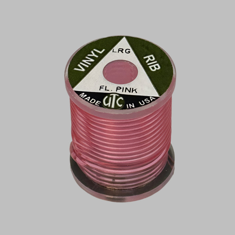 Vinyl D-rib cord spool in fluorescent pink, ribbed flexible vinyl winding
