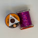 2 Spools of Fuchsia Tinsel from two angles, one with label showing