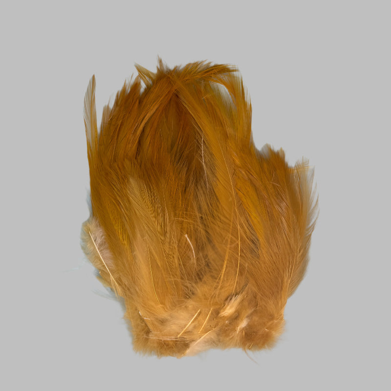 Strung neck hackle feathers, golden yellow tuft
