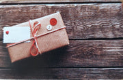 Gift card tag with red seal and tied red string
