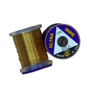 Ultra Wire spool with gold wire wound around a clear plastic holder.
