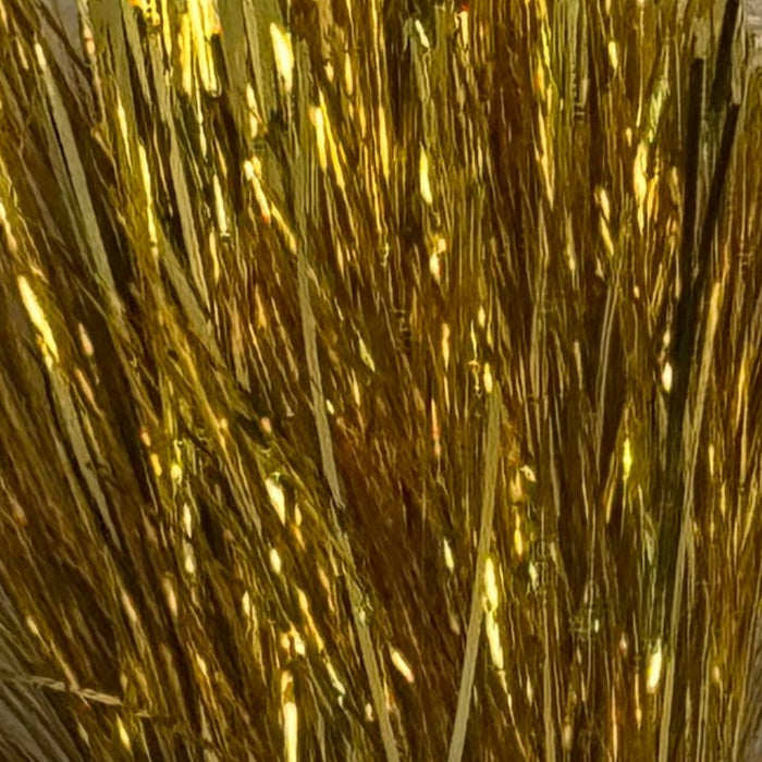 Gold colored tinsel flash strands close up