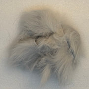 Crosscut rabbit fur strands in light gray