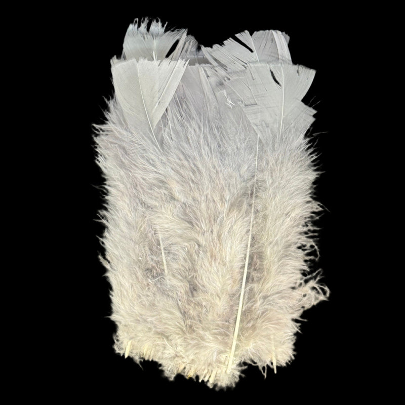 Light gray feather turkey flats with dense layered tufts and pale yellow base