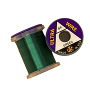 Wire spool with green wire; purple labeled roll shown