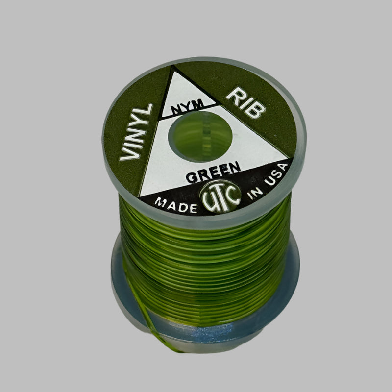 Spool of vinyl rib trim in green with coiled strand