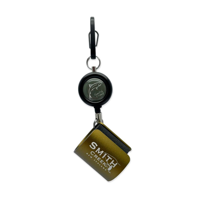 Rod clip with metal hook, black round housing, and Smith Creek logo charm