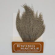 Speckled black-and-white dry fly top cape with feather tips