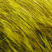 Dyed hare mask fur close-up in bright chartreuse-green strands
