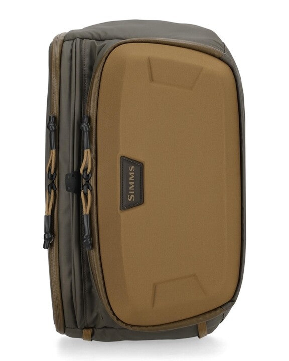 Simms sling pack in Hickory with gray lining and front zip pocket