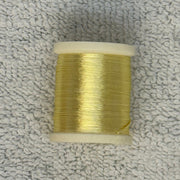 Four-strand floss spool in olive-gold