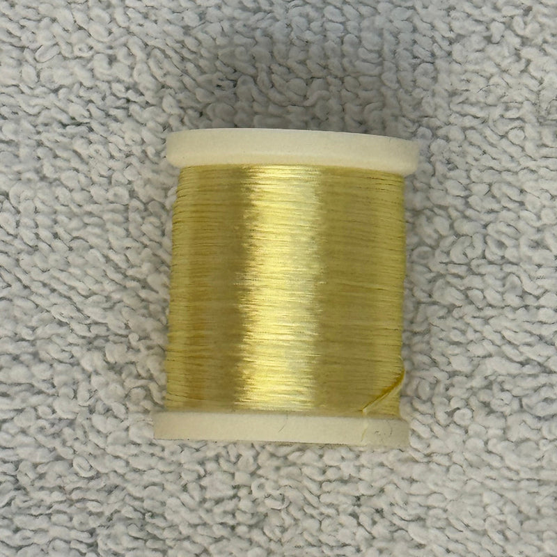 Four-strand floss spool in olive-gold