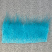 Light blue/turquoise fur fabric swatch rectangle with dense long pile