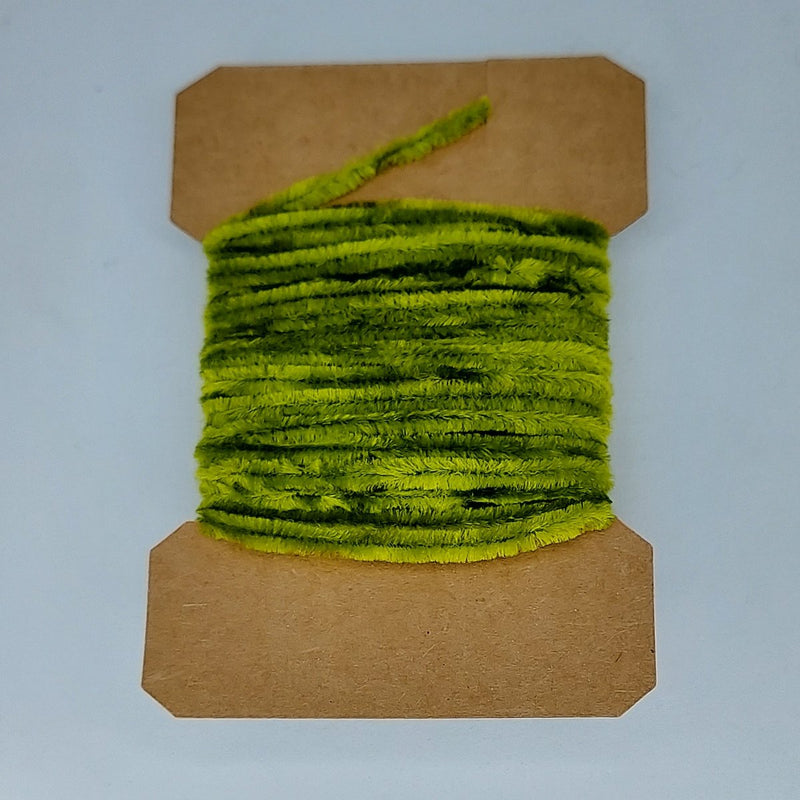Medium rayon chenille yarn spool in light olive green with ribbed fuzzy texture