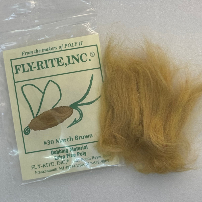 March brown dubbing material fibers in a clear bag with label