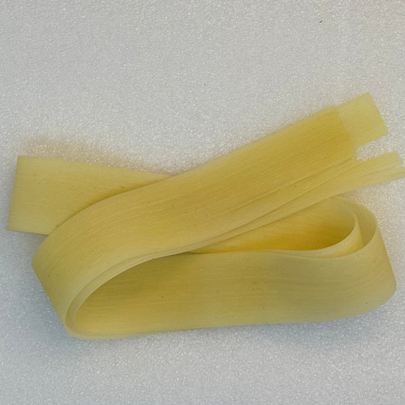 Round rubber strip, natural cream yellow curved loops