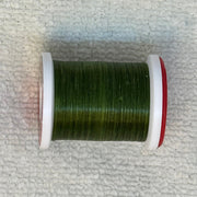 Spool of 70 denier thread in dark green with red side flanges