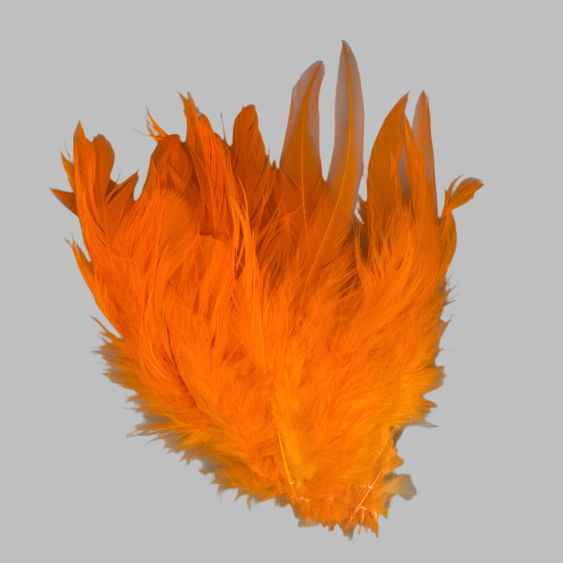 Orange strung schlappen feathers with pointed tips