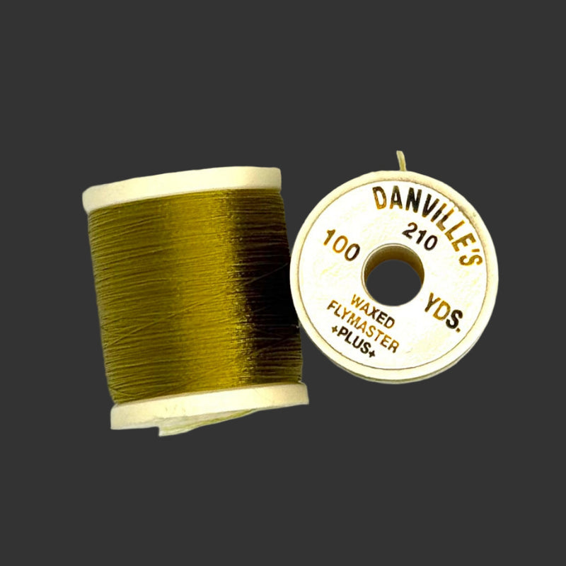 Waxed flymaster plus thread spool in olive green, with printed label