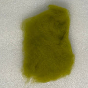 Yellow-green fly tying dubbing fibers clump, soft and fluffy