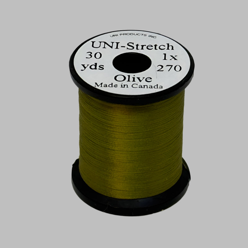 Olive stretch thread spool with label on top, 30 yd