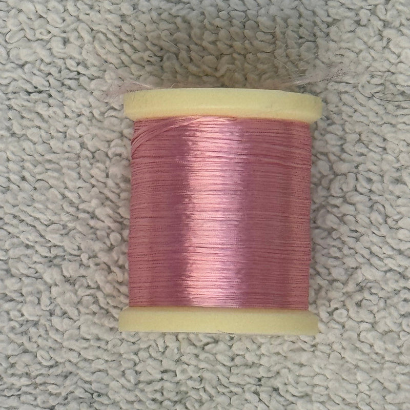 Four-strand floss spool in rose pink