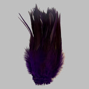 Strung rooster saddle feathers, deep purple with layered quills and barbs.