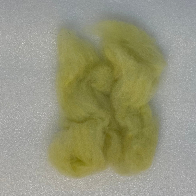 Light yellow fly tying dubbing fibers clump, soft and fluffy