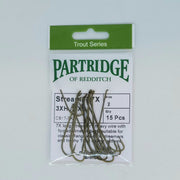 Streamer fishing hook set in retail pack, multiple dark hooks in plastic