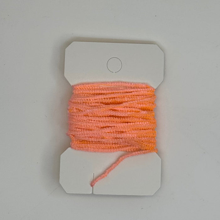 Peach very fine chenille horizontally wrapped around white card