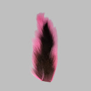 Medium bucktail tuft, pink with black center