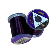 Ultra Wire spool with purple wire wound around a clear plastic holder.
