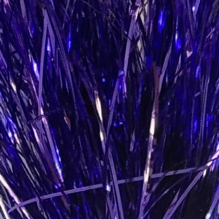 Purple colored tinsel flash strands close up