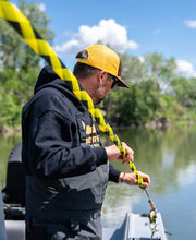 Loon Quickdraw rod sleeve with yellow and black stripes on fishing rod