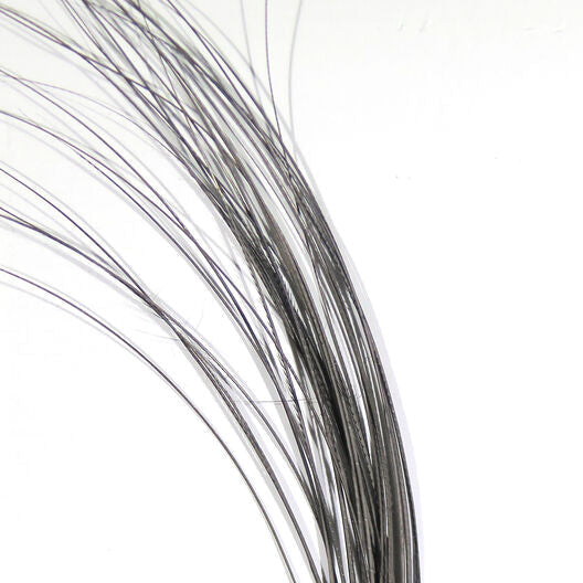 Quill body fly with dark gray feather fibers, curved strand bundle