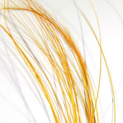 Quill body fly with yellow feather fibers, layered strand bundle