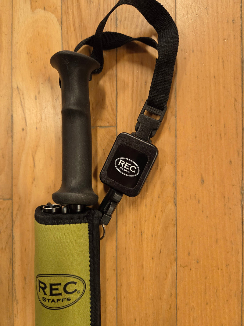 REC Staff wading staff with black handle, green neoprene cover, and chest strap