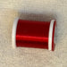 Close up RED spool of ultra thread 70