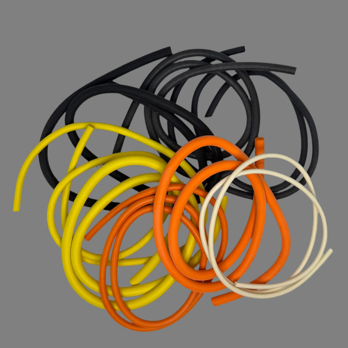 Black Orange and White 24inch spirals of  cylindrical float foam in varying thicknesses