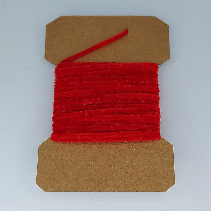 a card of red chenille