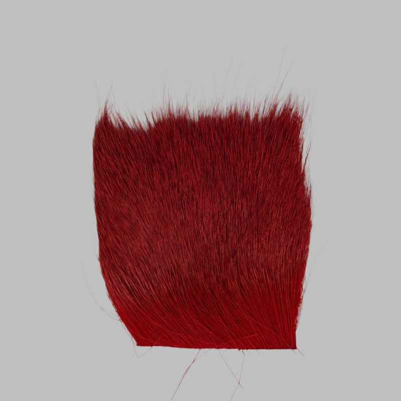 Red deer hair patch with dense fibers and uneven trimmed edge