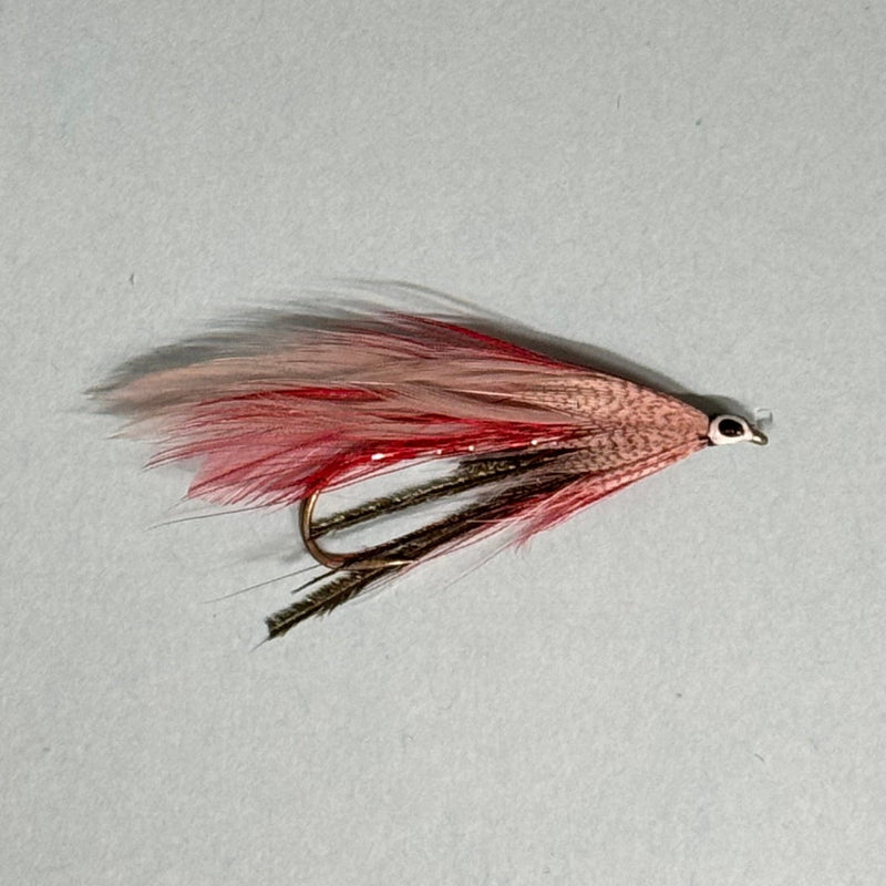 Red and gray feather fishing lure with hook and glossy bead head