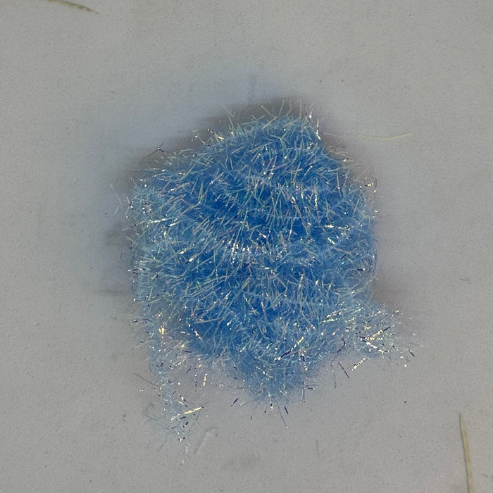 Close up of light blue estaz wound in a spiral ball