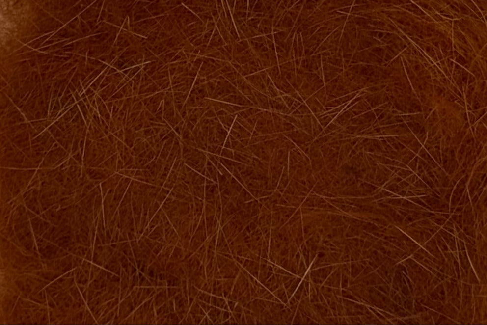 Close up of Rust colored dubbing