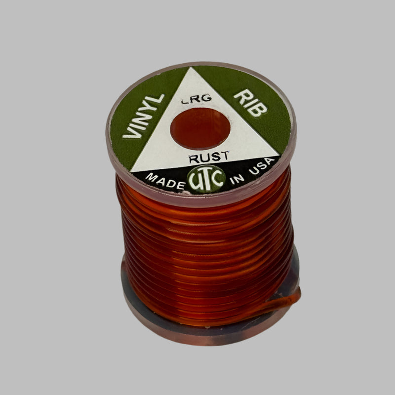 Vinyl D-rib cord spool in rust brown, ribbed flexible vinyl winding