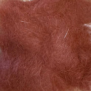Rabbit dubbing material, rust red loose fibers