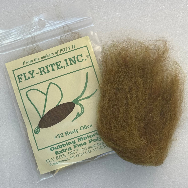 Rusty olive dubbing material fibers in a clear bag with label